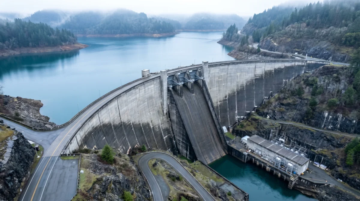 Aerial view of a hydroelectric dam and reservoir